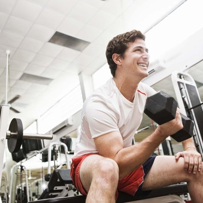 Man lifting dumbbells