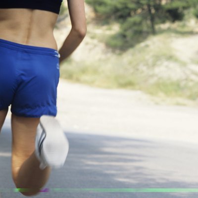 Jogger on road, Murcia, Spain