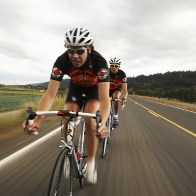 Road cyclists in action on country road