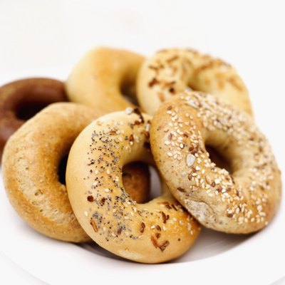 Close-up of an array of assorted bagels on a plate