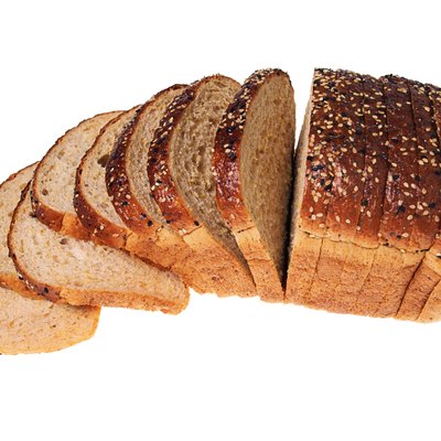 High angle still life of a sliced loaf of bread.