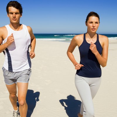 Couple running on beach
