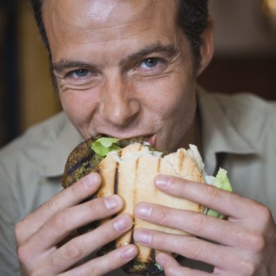 Man eating burger