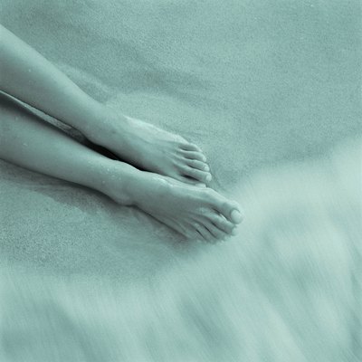 Womans Feet on Beach