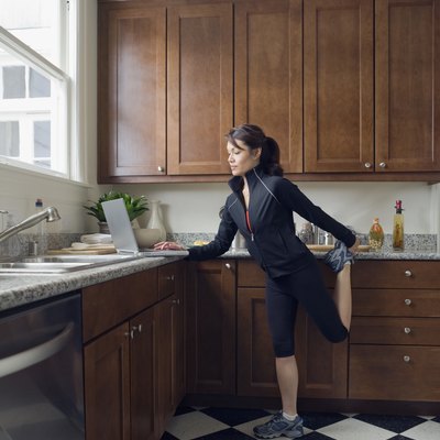 Pacific Islander woman stretching