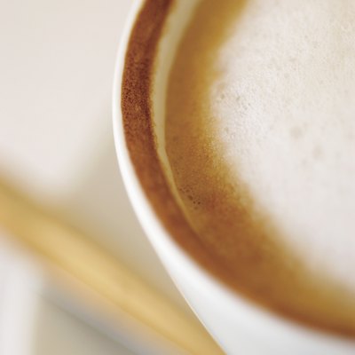 Overhead view of cappuccino in white cup