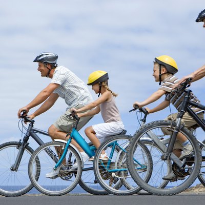 Family riding bikes together