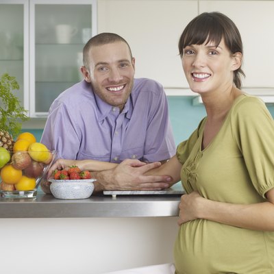 Smiling couple in kitchen
