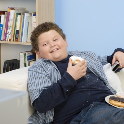 Boy Eating Donuts