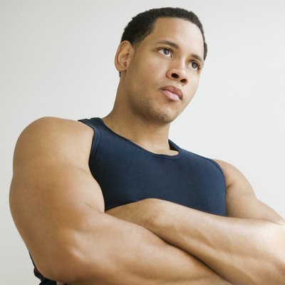 Studio shot of African American man with arms crossed