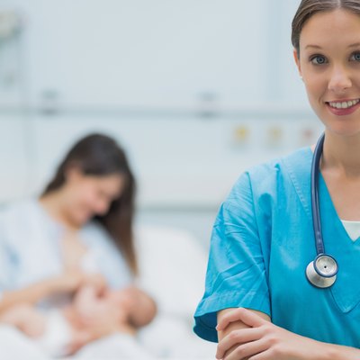 Smiling doctor standing in the foreground