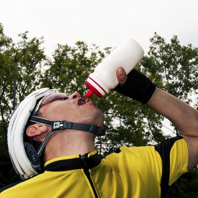 Cyclist drinking an energy drink