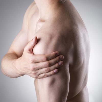 Man with pain in shoulder. Pain in the human body