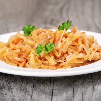 Stew cabbage on rustic table