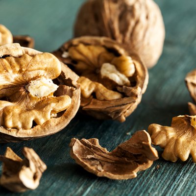 Walnuts on wooden table