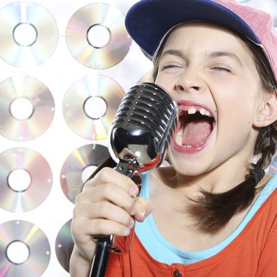 Singing girl in the orange cap