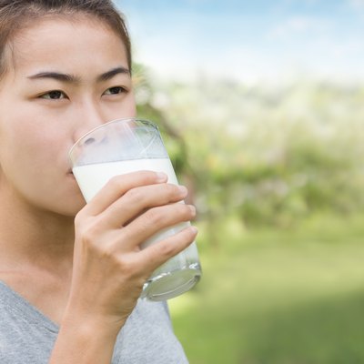 women drinking milk healthy lifestyle outdoor
