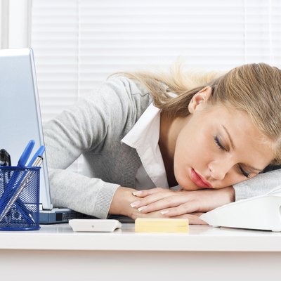 Tired businesswoman