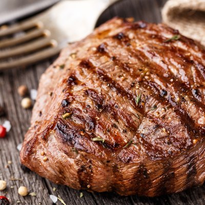 Beef steak on a wooden board