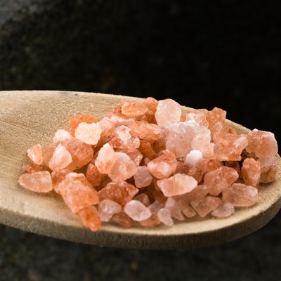 Spoonful of pink Himalayan rock