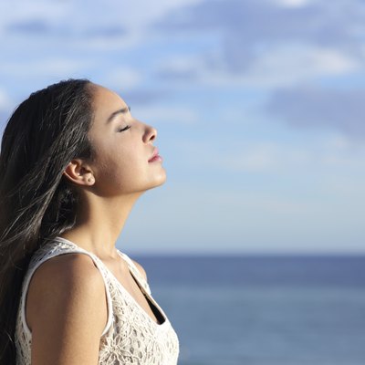 Profile of an arab woman breathing fresh air