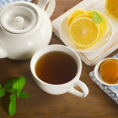 Teapot and cup with tea