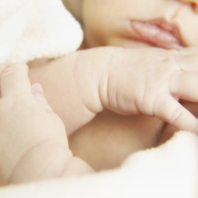 Portrait of a newborns hands and mouth
