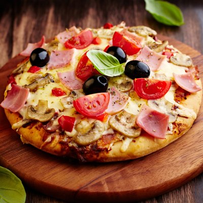 Pizza with mushrooms and ham
