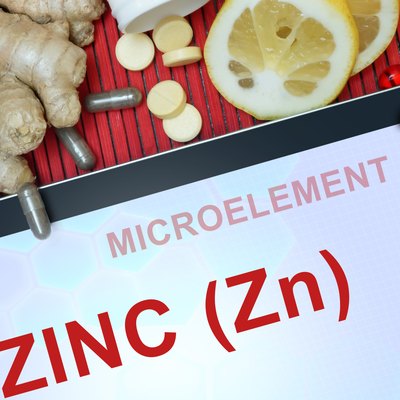 Tablet with words Zinc (Zn). microelements.