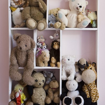 Stuffed animals on shelves