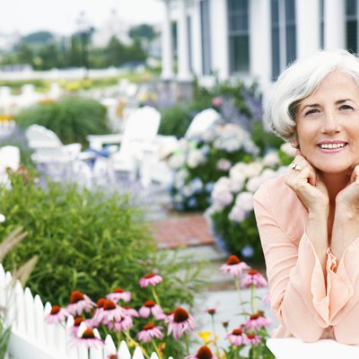 Woman in blooming garden