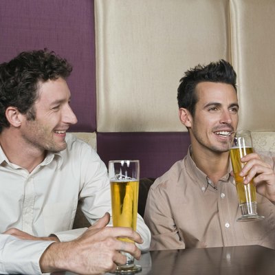 Men drinking beer in a bar