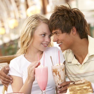 Couple drinking milkshake