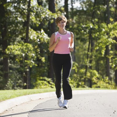 Woman running down street