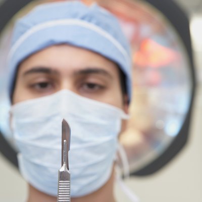 Close up of Indian male doctor with scalpel