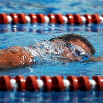 "An Airman swims in the 1,600-meter relay during the 379th Air Expeditionary Wing Sports Day on Sunday, April 23, 2006."