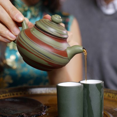 Woman pouring tea