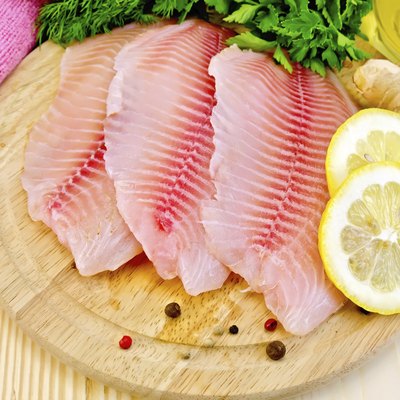 Tilapia with oil and lemon on board