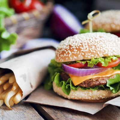 Closeup of home made burgers on wooden background