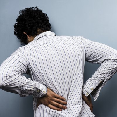 Young man with back pain