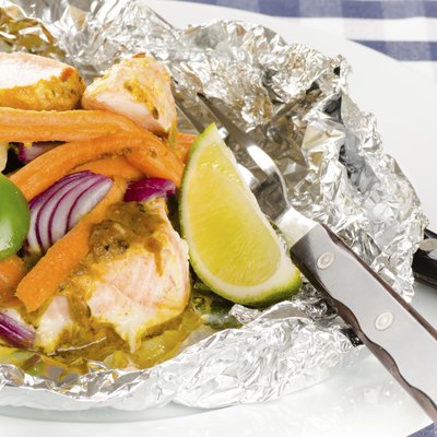 baked salmon with vegetables in a foil
