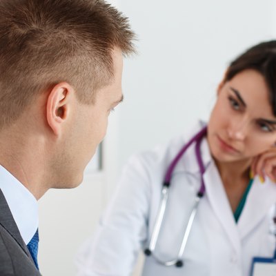Bored and tired female medicine doctor trying to listening patie