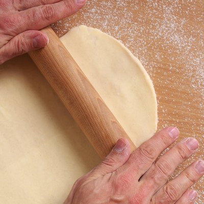 Rolling dough. Making Puff Pastry Series.