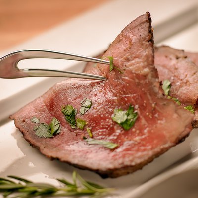 Roast beef and serving fork