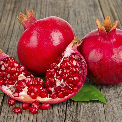 Fresh ripe pomegranates with leave