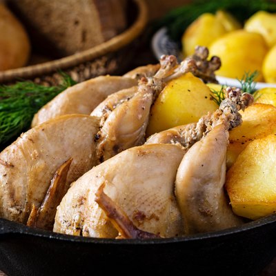 Roasted whole chicken and potatoes