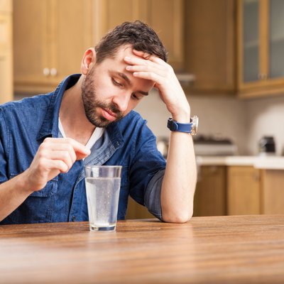 Young man with heartburn