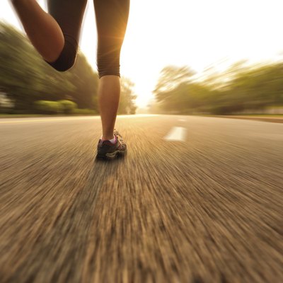 healthy lifestyle fitness sports woman running on road