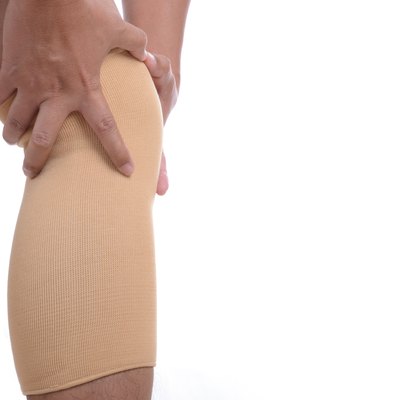 Man leg with brace knee support protection pain problem