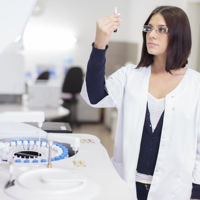 Young woman in the medical laboratory